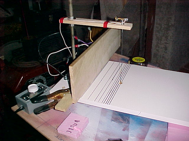 side view of foam cutter with tall fence.jpg